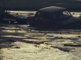 Потоп в Днепропетровске: в огромных лужах тонут машины (ФОТО)