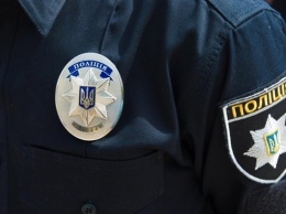 В Киевской области полицейского подозревают в завладении "евробляхой"