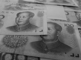 Китайские биткоин-инвесторы охотно платят наценку за Tether