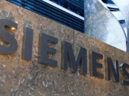 Чистая прибыль компании Siemens сократилась почти на треть