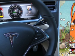Владельцы Tesla смогут играть в Cuphead прямо в машине
