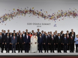Саммит G20: Путин с металлической кружкой, морские ежи на обед и торжественный прием Абэ