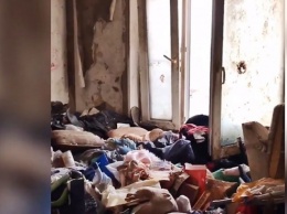 В Запорожье труп хозяйки квартиры доставили из-под двухметрового слоя мусора
