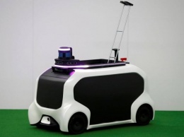 Toyota показала миниатюрный робомобиль для доставки снарядов для метания на Олимпиаде в Токио