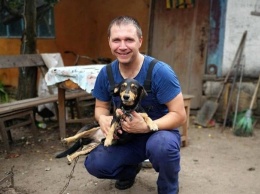 На руках с 20-метровой глубины и фото на память: на Днепропетровщине спасают собачек, - ФОТО