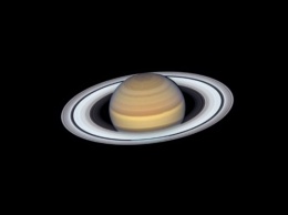 Сатурн с кольцами: телескоп Hubble сделал новое яркое фото