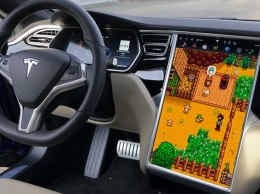 В электромобиле Tesla появилось две новые игры, а акции компании достигли скандальной отметки в $420