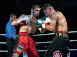 Украинский боксер подерется с россиянином за вакантный пояс WBO