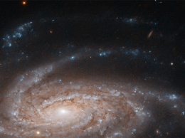 Фото дня: призрачные рукава спиральной галактики
