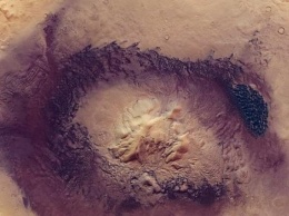 Опубликован удивительный снимок кратера на Марсе