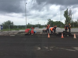 Дождь не нарушил планы "дорожников" по ремонту центрального проспекта Кривого Рога, - ФОТО