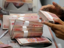 Китай напечатает десятки триллионов юаней из-за угрозы рецессии