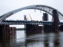 Хищения на строительстве Подольского моста: полиция провела 17 обысков