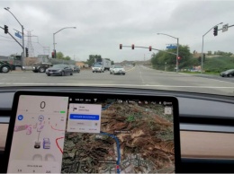 Tesla показала новый софт для беспилотных электрокаров