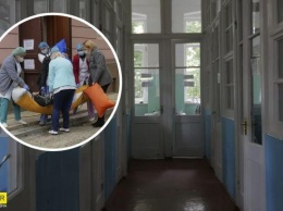 Женщины носят больных с COVID-19 на простынях: видео ужасов больницы в Черновцах