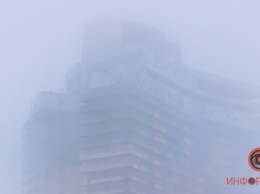 Промерзший до камешков Днепр: как город прятался от холода и "укутывался" в туман, пытаясь согреться