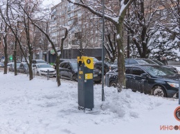 Расчистили ли платные парковки в Днепре после снежной бури