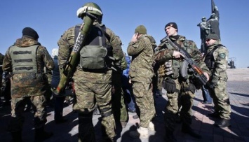 Алчевские боевики перекрыли мусором дорогу миссии ОБСЕ