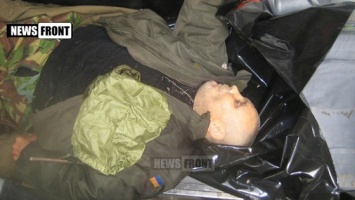 Боевики похвастались убийством матроса ВСУ и выложили фото его тела (ФОТО)