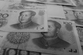 Китайские биткоин-инвесторы охотно платят наценку за Tether