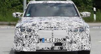 Новый BMW M3 CS частично лишился камуфляжа в недавнем шпионском видео с Нюрбургринга