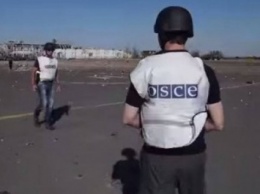 Миссия ОБСЕ посетила место взрыва вагонов с топливом в Луганской области