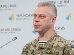 За минувшие сутки в зоне АТО потерь нет, 8 украинских военных получили ранения, - Лысенко