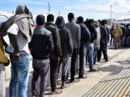 Туск предупредил об угрозе наплыва беженцев через Ливию