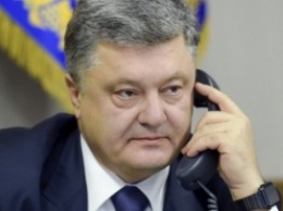 Порошенко обсудил с Путиным обмен Савченко на ГРУшников