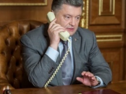 Порошенко поговорил с Путиным об обмене Савченко на ГРУшников, но Надежда не считает их дело аналогичным своему