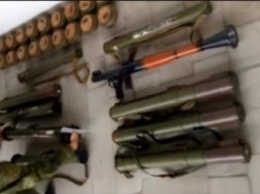 В пригороде Северодонецка в укромном месте припрятали целый арсенал боеприпасов