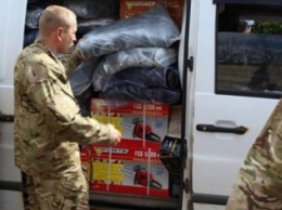 Волонтеры доставили в зону АТО несколько тонн военного снаряжения (фото)