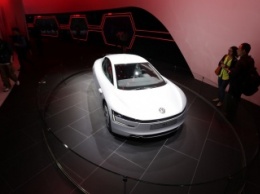 В КНР представят первый в мире электрокар с автопилотом