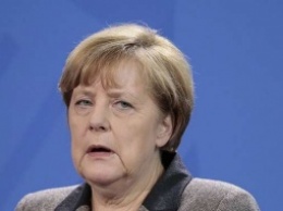Меркель призывает ускорить подготовку выборов на Донбассе