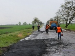 Непогода не помеха для ремонта трассы Геническ - Херсон