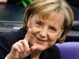 Меркель призывает ускорить выборы в Донбассе