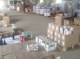 Нацполиция обнаружила склад фальсифицированного алкоголя в Киевской области (фото)