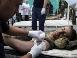 Военные врачи в зоне АТО эвакуировали около 3 тыс. раненых бойцов