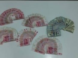 Николаевские таможенники задержали китайцев с контрабандной валютой