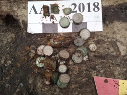 Клад времен первой Украинской революции. Почти 2 кг серебряных монет нашли археологи в Киеве