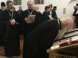 Объединительный собор начался с совместной литургии представителей трех ветвей украинского православия