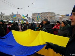 Комментарий: Год важных решений и неоконченной войны для Украины