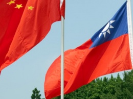 Си Цзиньпин угрожает Тайваню силой, но стремится к мирному "воссоединению"