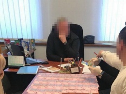 Начальник управления одной из РГА Харькова попался на взятке