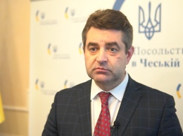 Россию нужно отключить от SWIFT - посол Украины в Чехии