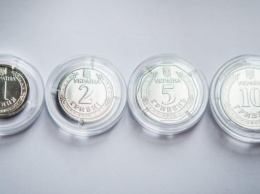 Чеканка гривни: украинцы сменят купюры на монеты