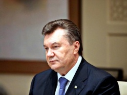 Януковича приговорили к 13 годам тюрьмы