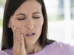 8 способов успокоить зуб мудрости, если болит сегодня, а к врачу - только завтра