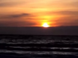 Восход солнца над морем в Кирилловке показали за несколько секунд (видео)