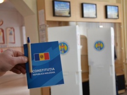 Граждане Молдовы на референдуме поддержали сокращение количества парламентариев на 40%
